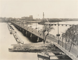 View of the bridge over the Fox river, and the Nicolet Paper Company in the distance.