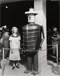 Girl posed with IH Robot