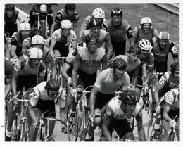 A crowd of bicyclists race during a fundraising event at Road America in 1982
