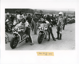 Five-time AMA Formula One Champion and all-time wins leader Mike Baldwin prepares to mount his bike, #43, at start of the 1983 race