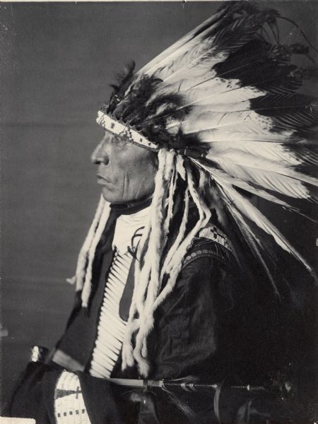 Profile portrait of Candi Tanka or Big Tabbaco, with headdress.