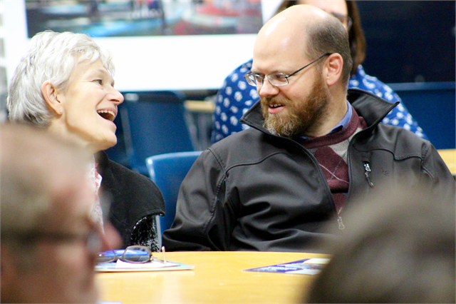 Guests share a laugh while discussing memorable museum experiences during the "Share Your Voice" session in Manitowoc on Nov. 8, 2018.