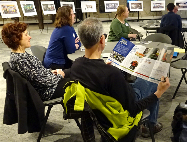 Guests review materials explaining the Wisconsin Historical Society's plan for a new Wisconsin history museum Feb. 21, 2019 at the "Share Your Voice" listening session at Madison's Goodman Community Center.