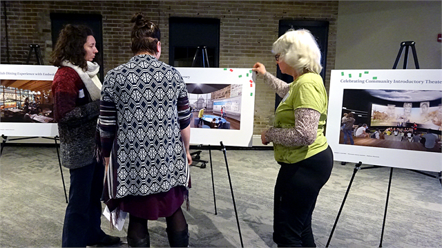 Guests examine early concept exhibit design renderings during an exercise at the Wisconsin Historical Society's "Share Your Voice" new museum listening session held Feb. 21, 2019 at the Goodman Community Center in Madison.