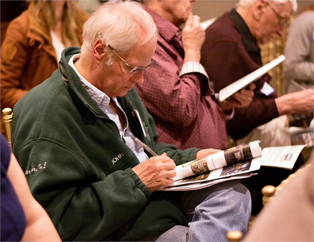 A guest writes down ideas on Post-It notes during an exercise at the Wisconsin Historical Society's "Share Your Voice" new museum listening session March 13, 2019 in Waukesha.