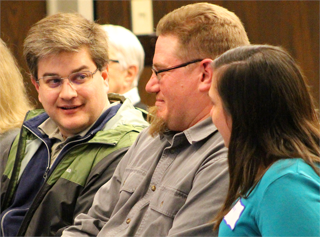 Tim Acklin, Historic Preservation Planner for the City of La Crosse, left, enjoys a chuckle with other guests during the Wisconsin Historical Society's "Share Your Voice" new museum public listening session at the La Crosse Public Library.