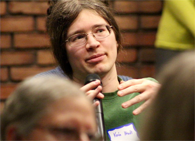 A young guest named Kevin Hundt offers his thoughts about a concept exhibit design rendering during the "Share Your Voice" new museum listening session April 17, 2019 in La Crosse.