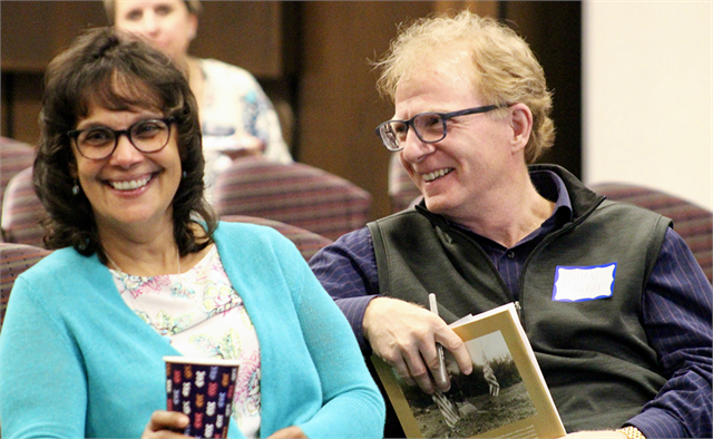 Judge Ramona Gonzalez, left, and her husband John Stuber enjoy a laugh during a discussion at the "Share Your Voice" session  in La Crosse. Gonzalez is a member of the Wisconsin Historical Society's Board of Curators.