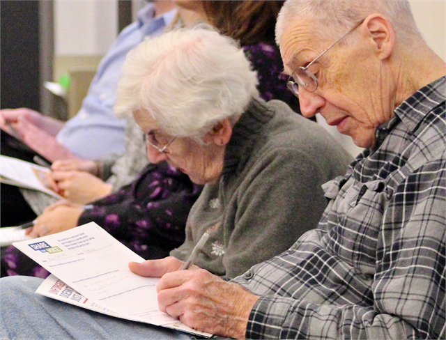 Guests write their comments about concept exhibit design renderings during the Wisconsin Historical Society's "Share Your Voice" new museum listening session May 2, 2019 at the Platteville Public Library.