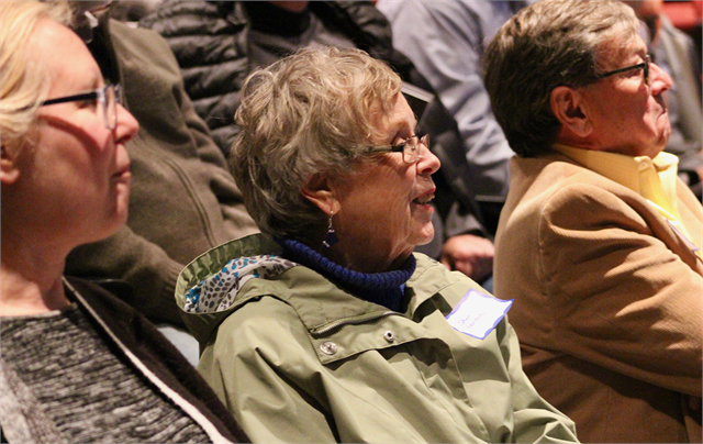 JoAnn Carlson enjoys a laugh during the "Share Your Voice" session in Hudson.