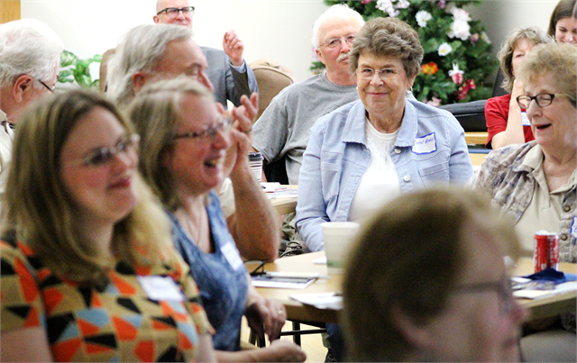 Guests enjoy a laugh during a discussion at the Wisconsin Historical Society's "Share Your Voice" new museum listening session for Barron County residents May 29, 2019 at the Cameron Senior Center in Cameron.