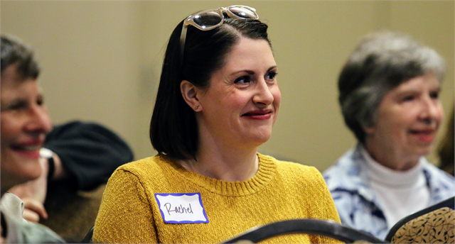 Rachel smiles as another guest shares a story during the Wisconsin Historical Society's "Share Your Voice" new museum listening session June 18, 2019 at the Harry and Rose Samson Jewish Community Center in Whitefish Bay.