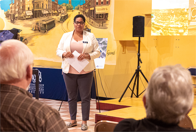 Tanika Apaloo, Coordinator of Multicultural Outreach for the Wisconsin Historical Society, welcomes guests to the Society's "Share Your Voice" new museum multicultural listening session June 19, 2019 at the Beloit Historical Society.