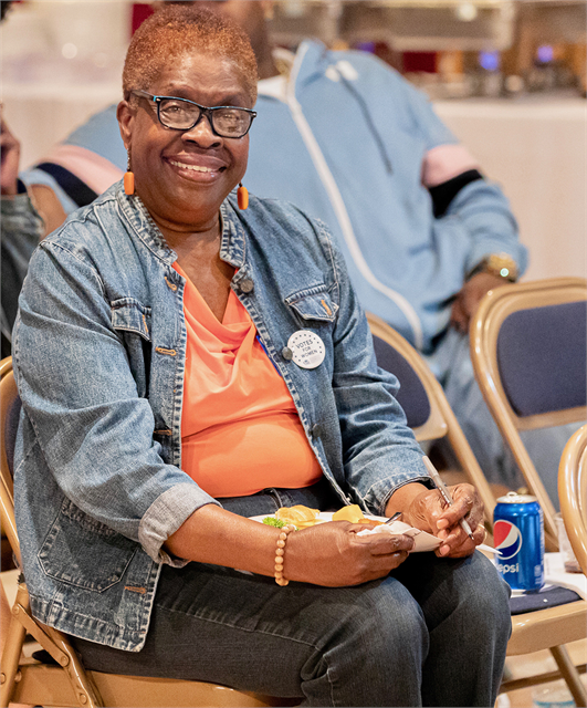 A guest smiles as she thinks about what new museum suggestions to write down during the Wisconsin Historical Society's "Share Your Voice" multicultural listening session June 19, 2019 at the Beloit Historical Society.