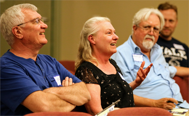 Margaret Berres (center) smiles as she talks about fish fries, as Tom Ludka (left) and George Wagner look on during the Wisconsin Historical Society's "Share Your Voice" new museum listening session June 27, 2019 in St. Francis.