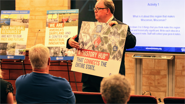 Wisconsin Historical Society Director Christian Øverland shows guests where the new Wisconsin history museum will be located on the Capital Square in Madison during the "Share Your Voice" listening session June 27, 2019 in St. Francis.