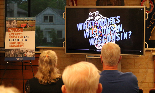 Guests watch a film about the new Wisconsin history museum's main storytelling theme — "What Makes Wisconsin, Wisconsin?" — during the Wisconsin Historical Society's "Share Your Voice" listening session June 27, 2019 at the St. Francis Civic Center.