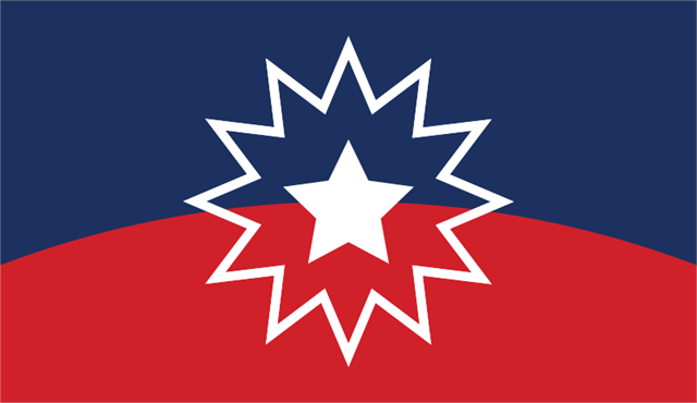 Image of a flag with white star and white starburst over blue sky and red rolling ground background