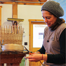 An artist at work in her studio.