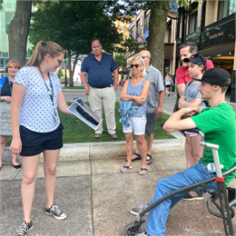 A guide leads the Capitol Square Walking tour.
