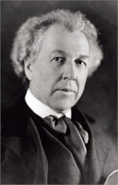 Studio portrait of Frank Lloyd Wright.