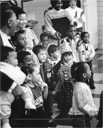Multi-ethnic children in traditional dress.