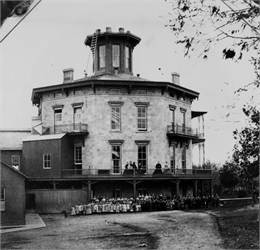 Group of people posing outside of Soldiers' Orphans Home.