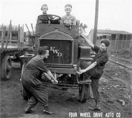Women manually crank starting a truck. The women joined the workforce during World War I and manufactured over 20,000 trucks in Clintonville, Wisconsin.