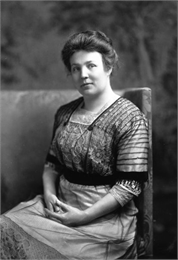 Studio portrait of Meta Berger seated.