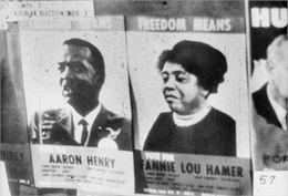 Black and white image of two election posters that say, 'Freedom Means Vote For Fanny Lou Hamer or Aaron Henry.'