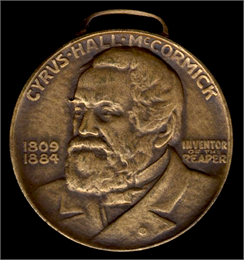 Front side of a coin featuring head and shoulders portrait of Cyrus Hall McCormick