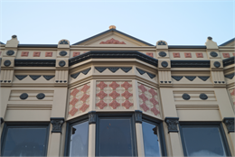 Pressed metal facade