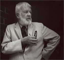 Paul Vanderbilt posed against a dark background.