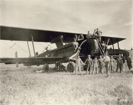 A vintage German Gotha airplane brought to Hollywood by Howard Hughes for use in "Hell's Angels," together with members of the Caddo Company's film crew and several members of the cast in the plane.