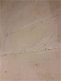 Poured concrete basement wall