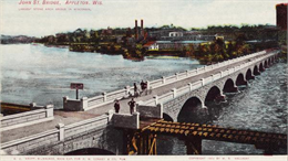 Caption on postcard: John St. Bridge, Appleton, Wis. "Largest stone arch bridge in Wisconsin."