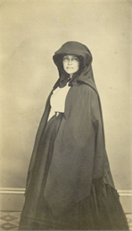 Carte-de-visite portrait of Cordelia Harvey wearing a hooded cape.