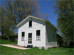 The first kindergarten, a small one to six room school.