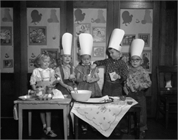 Kindergarteners at Dudgeon School in Mrs. Virginia Price's class make a pumpkin pie.