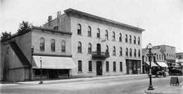 Exterior of Central House, later known as the Boscobel Hotel, with cars parked outside.