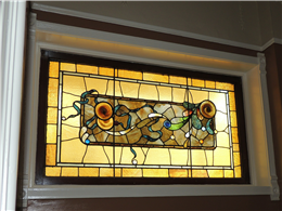 An original 1902 stained glass window in great condition. 