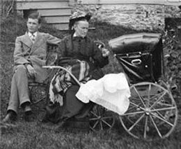 Family with a baby in a carriage