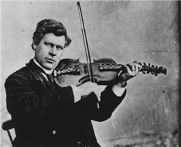 Man playing a Hardanger fiddle