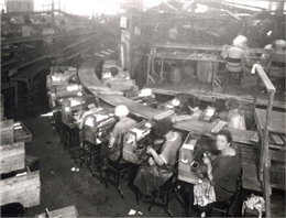 Women assembling zinc-carbon batteries at the French Battery Co.