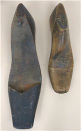 Shoe last of Frederick Shadick's left foot compared to a size 9 shoe