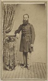 Full-length carte-de-visite portrait of Dr. Christopher Ruby Blackall, 33rd Wisconsin Infantry, standing in his uniform with his hat on a pedestal.