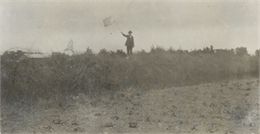 Earthwork four miles southwest of Racine, used during the Civil War in light artillery target practice to stop solid shot. Joseph Cooper is waving the flag.