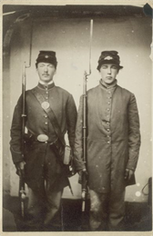Three-quarter length portrait of Herman and Lewis Gudmundsen from Dunkirk, Wisconsin