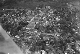 Aerial photograph of Mineral Point taken as part of a survey by the Wisconsin Power and Light Company to promote economic development by emphasizing available buildings and building sites.