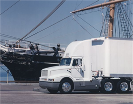 1987 International 8300 semi-truck near ship